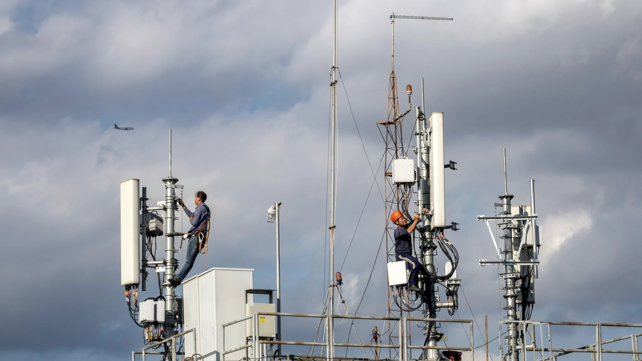 Telecom field crew completing equipment work